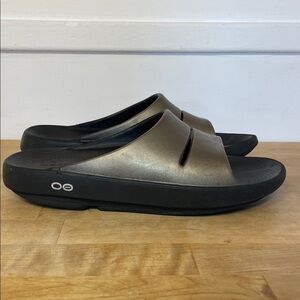OOFOS Metallic Bronze Slide Sandals with Black Sole